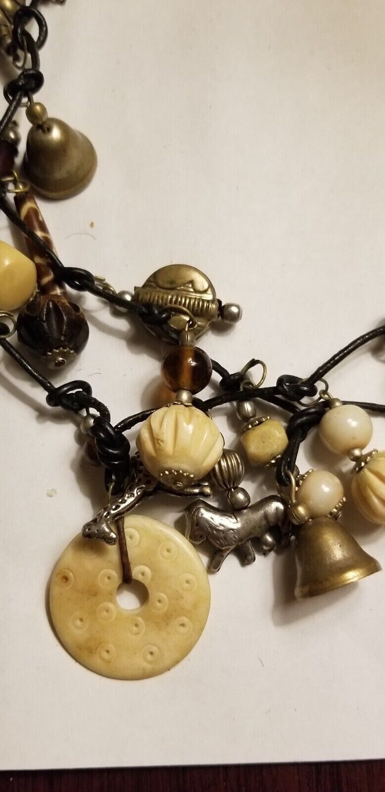 VINTAGE MOROCCAN ANIMAL CHARM NECKLACE LEATHER CORD SUSAN CUMMINGS STYLE