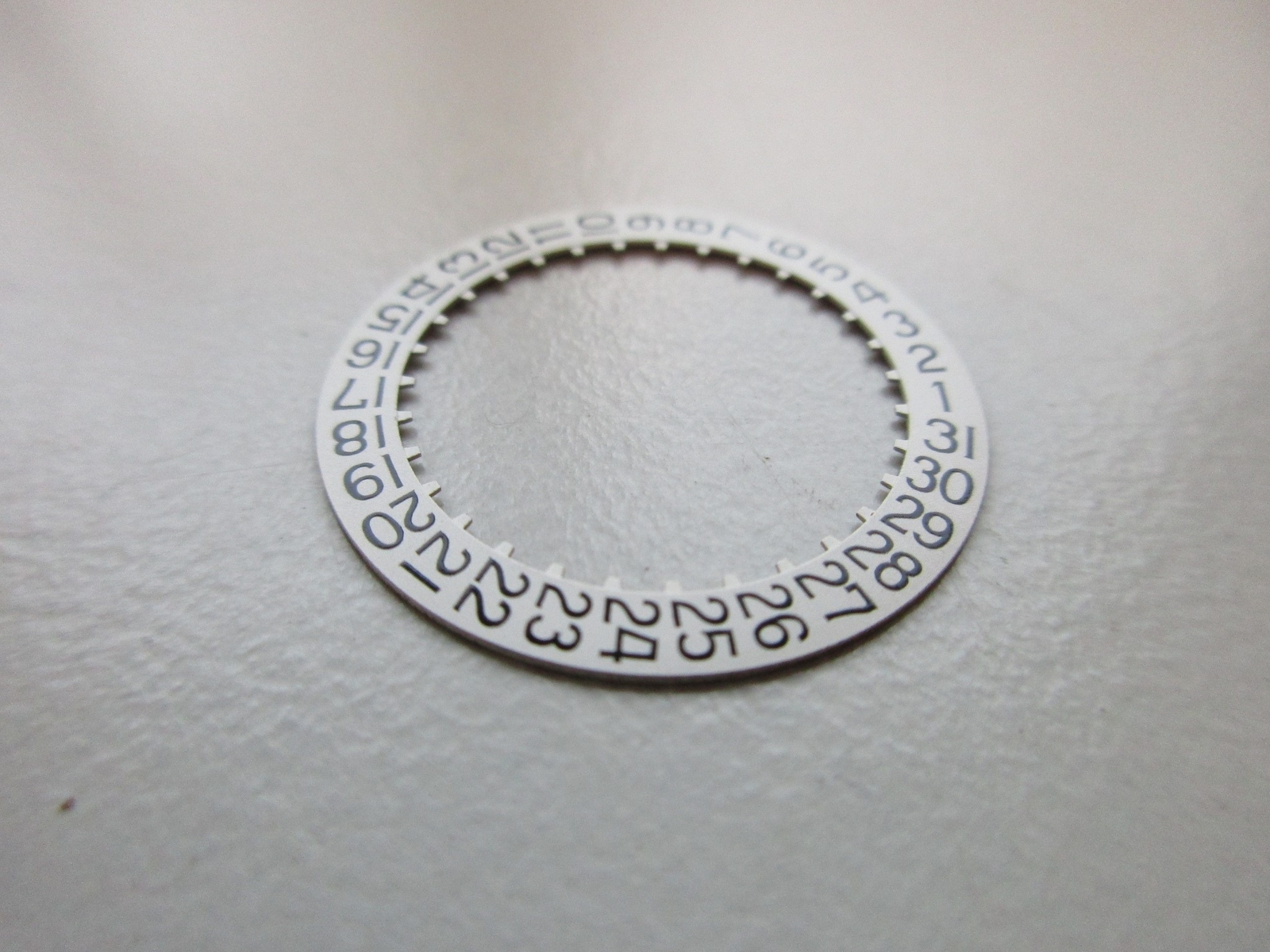 ETA 11½”‘ cal. 2784 Silver DATE disk pos. at 3 Swiss watch movement part