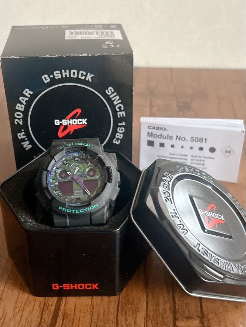 G SHOCK GA 100 1A purple camouflage