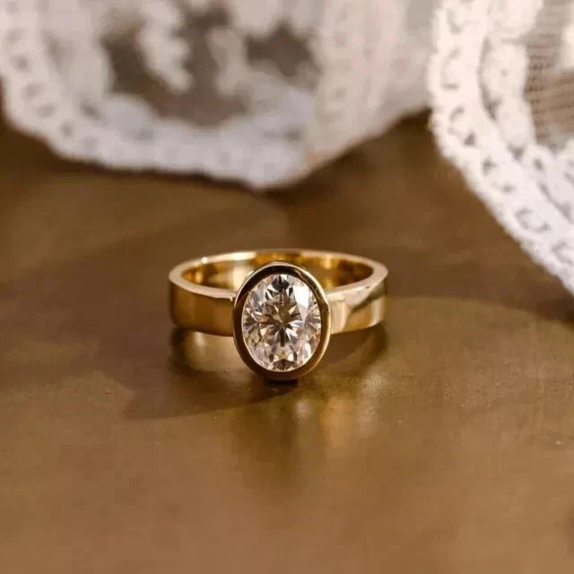 2.00 Ct Oval Cut VVS1 Moissanite Bezel Engagement Ring 14k Yellow Gold Plated