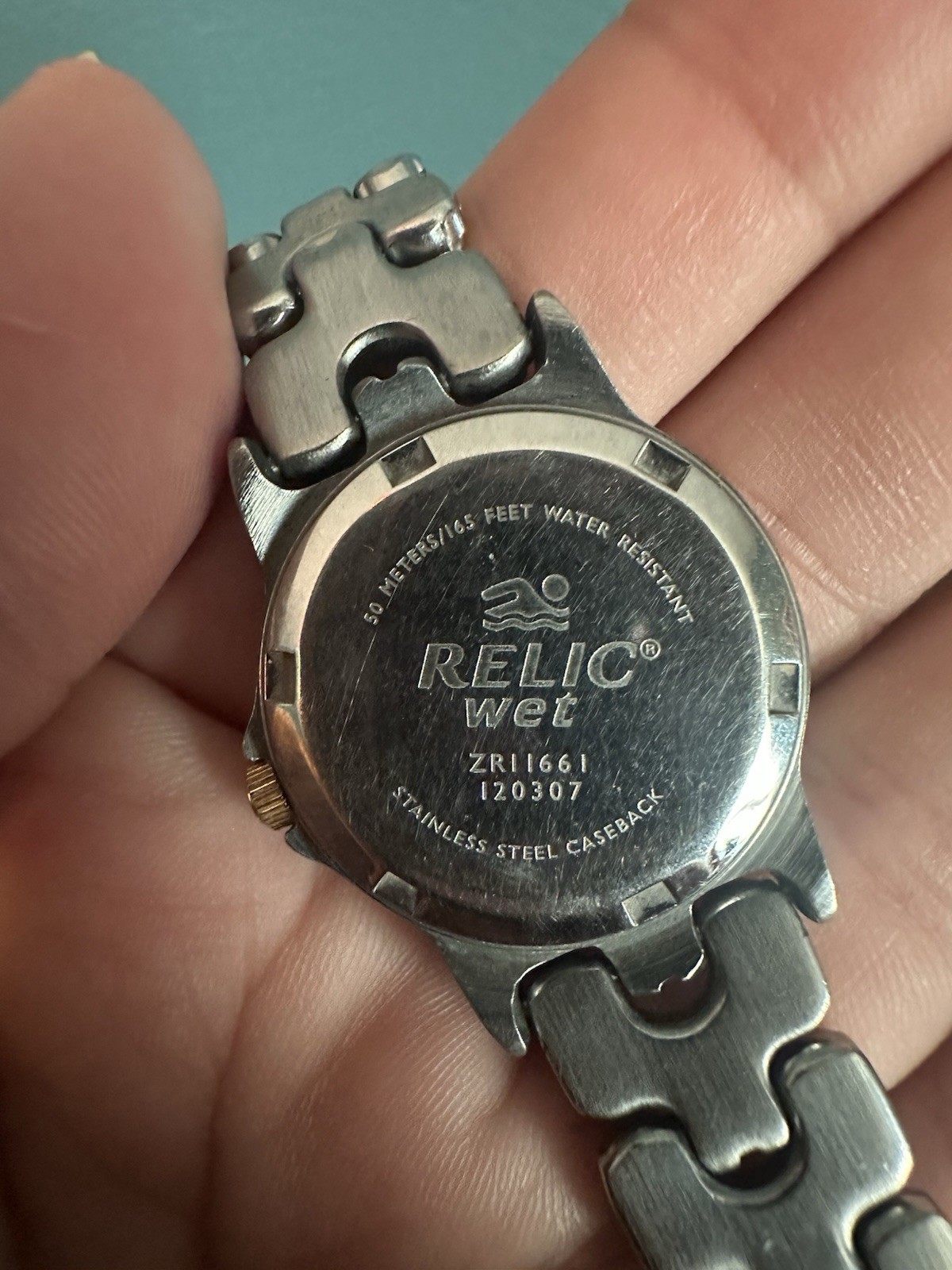 Relic Wet Women’s Quartz Silver Stainless Bracelet Watch Black Dial Date 50m