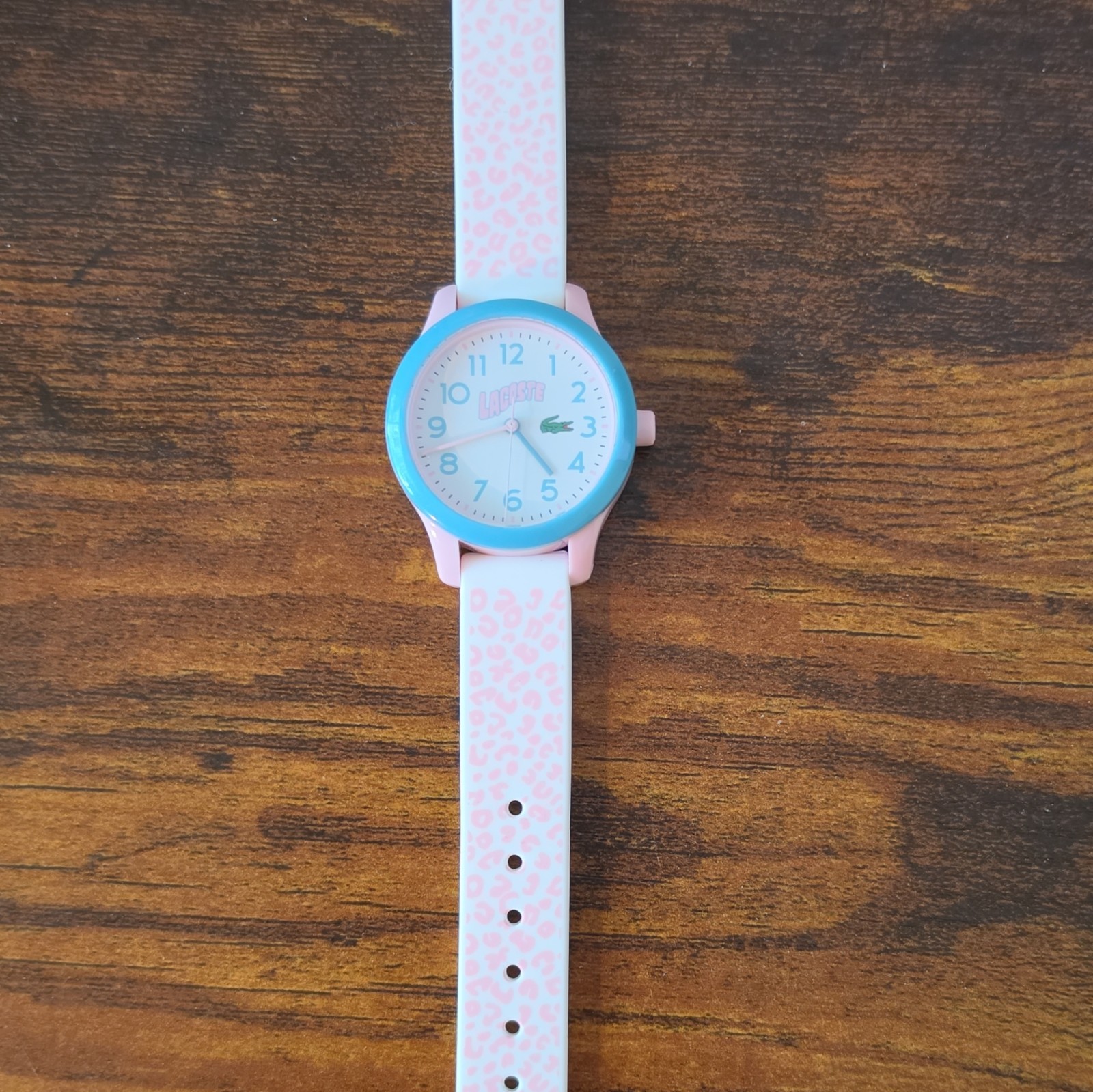 Lacoste Unisex Kids Analog Wristwatch Pink Silicone Strap Blue Bezel White