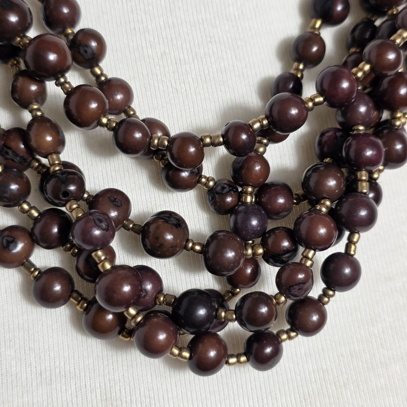 Multi-Strand Brown Acai Seed Bead Necklace with Gold Seed Bead Spacers