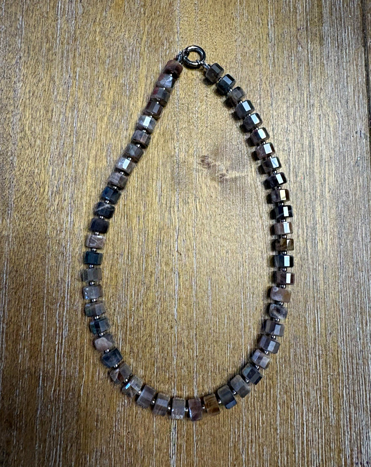 Oh Clem built necklace with one broken stone. Can be restrung and look beautiful