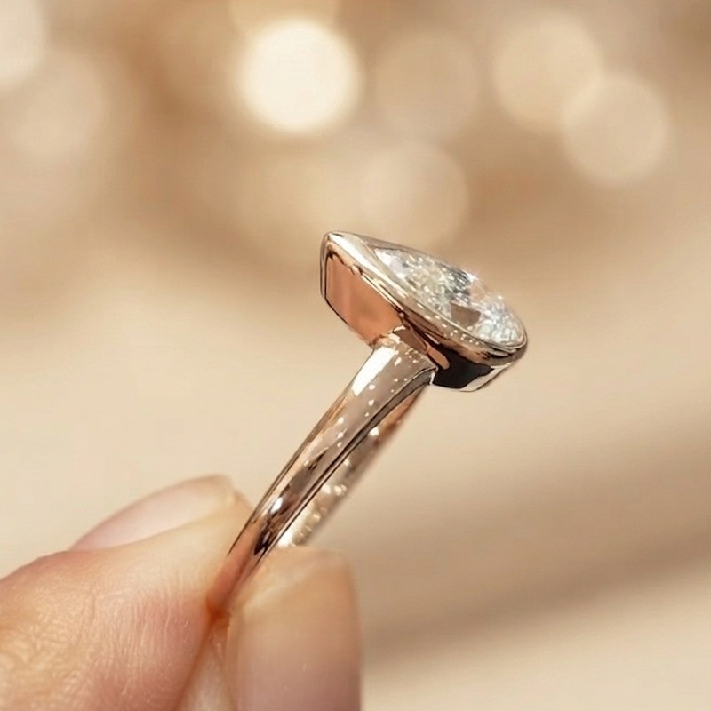 1.90 CT Pear Cut Moissanite Bezel Set Engagement Ring in 14K Yellow Gold Plated