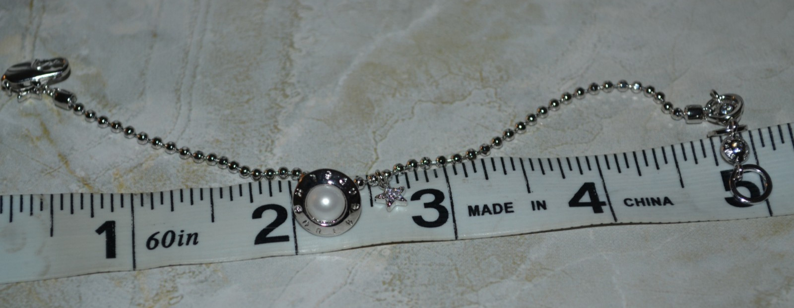 Henri Bendel Chain Bracelet Saturn Pearl Charm