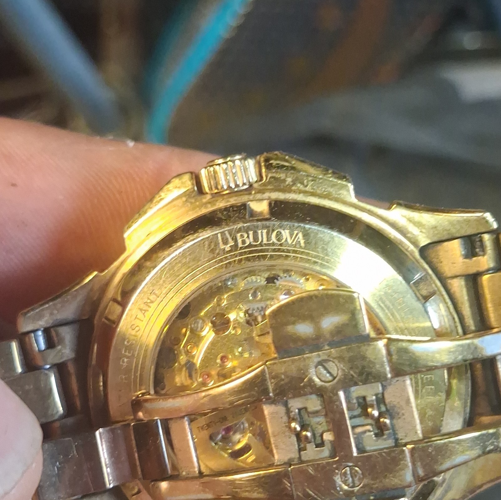 Bulova Mens Automatic Skeleton Dial Gold-Tone Bracelet Watch Crystal Bezel
