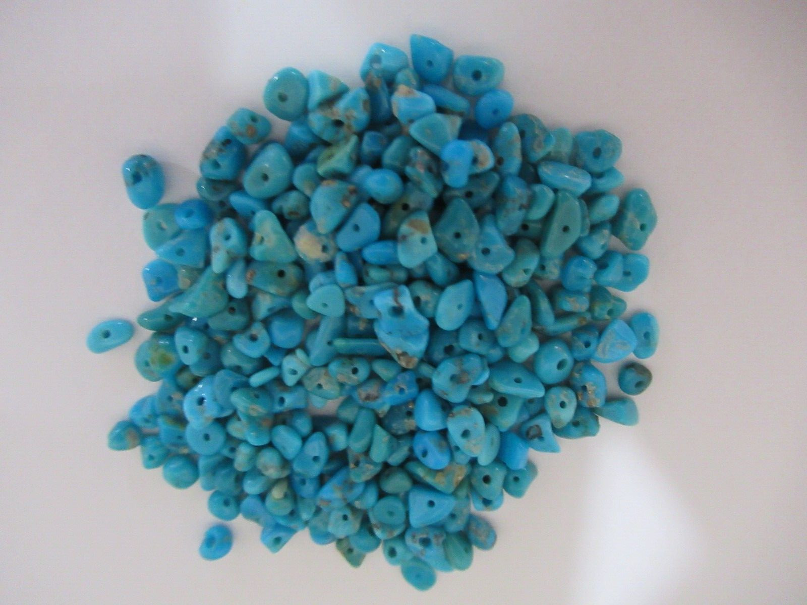SLEEPING BEAUTY TURQUOISE 1/2 OZ SMALL DRILLED NUGGETS 4X3mm TO 7X4mm #642