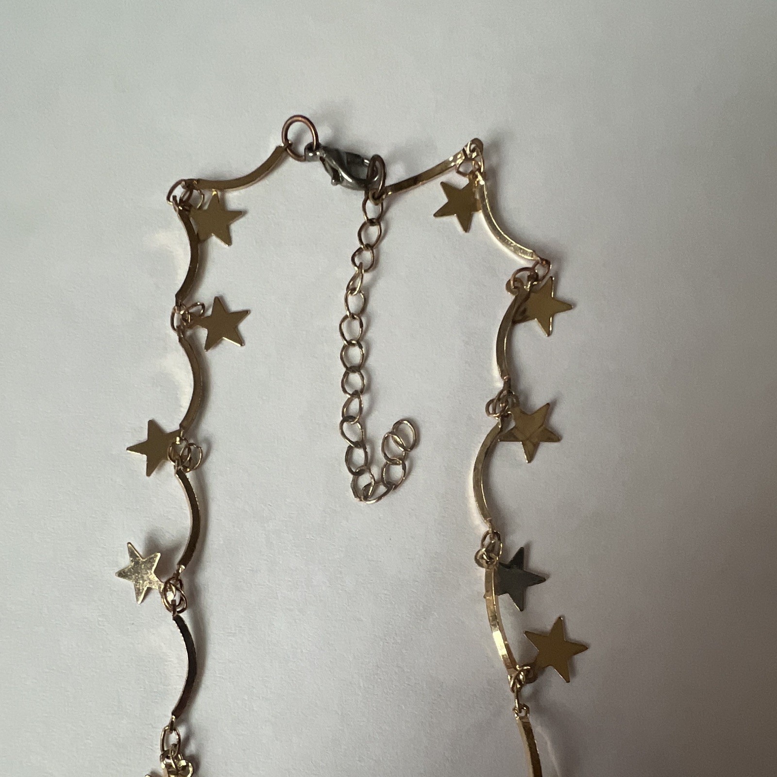 Gold Star Necklace With Silver Clasp