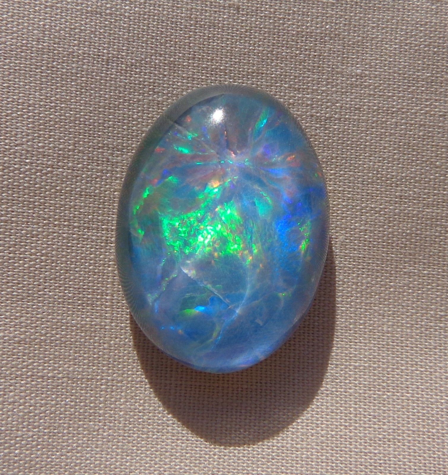 Spencer Idaho Opal Triplet 15X20mm with a Blazing Green Fire in a Galaxy Pattern