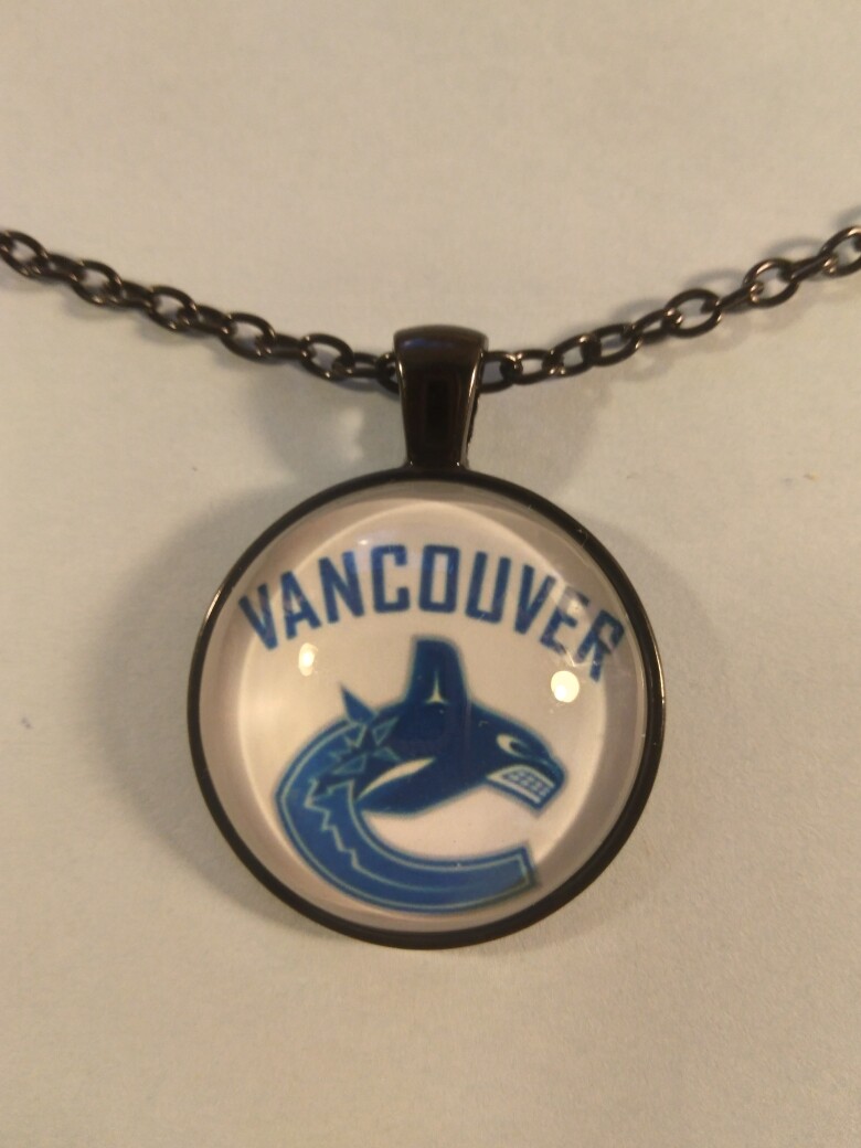 Vancouver Canucks pendant on 19 1/2 inch Black Necklace 249610