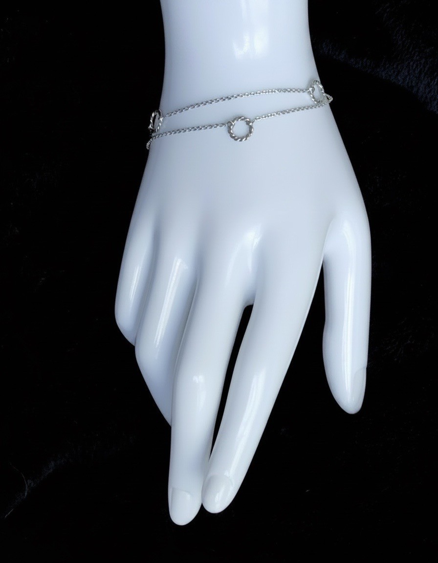 LA PRECIOSA STERLING SILVER DOUBLE STRAND TWISTED OPEN CIRCLE BRACELET 7 INCHES
