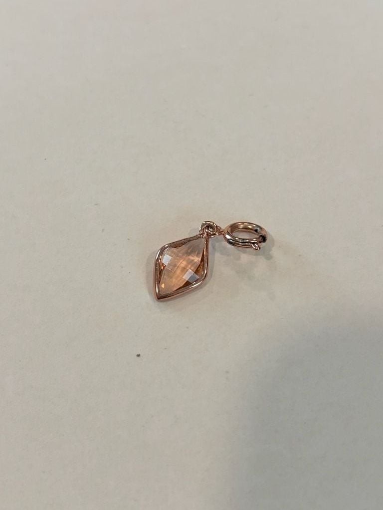 Set of 5 Rose Gold Tone Fashion Bracelets, a Ring and a Charm