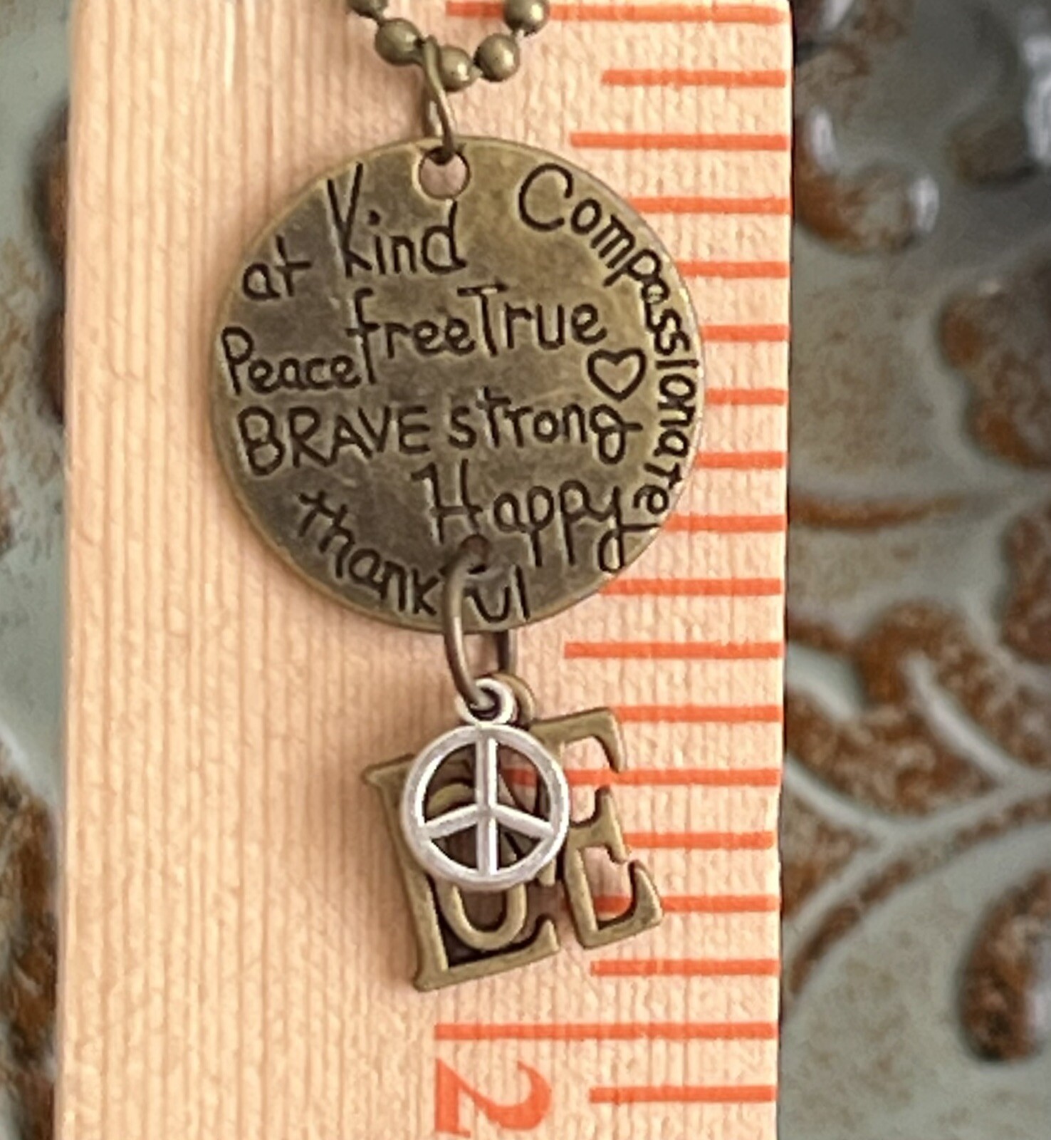 Beautiful BE KIND Etched Bronze Necklace. Love.