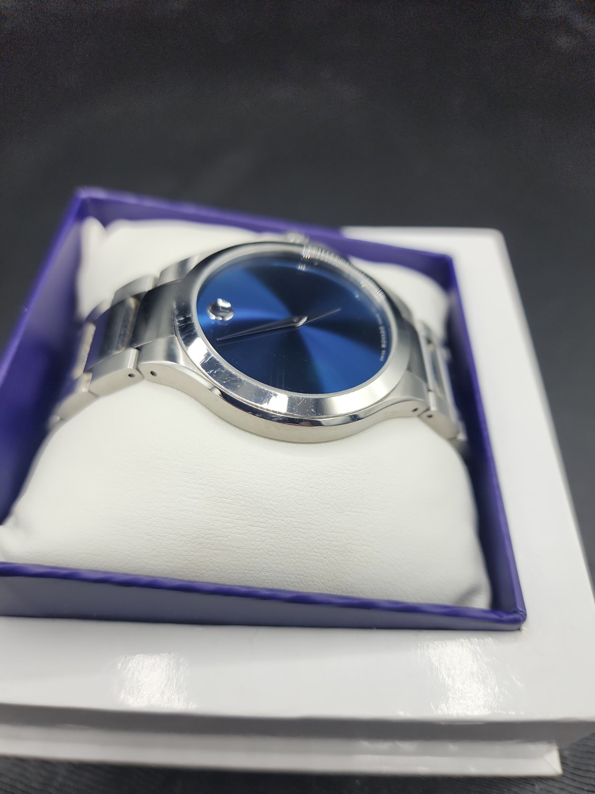 Movado Stainless Steel Defio Men’s Blue Museum Dial Dress Watch new battery