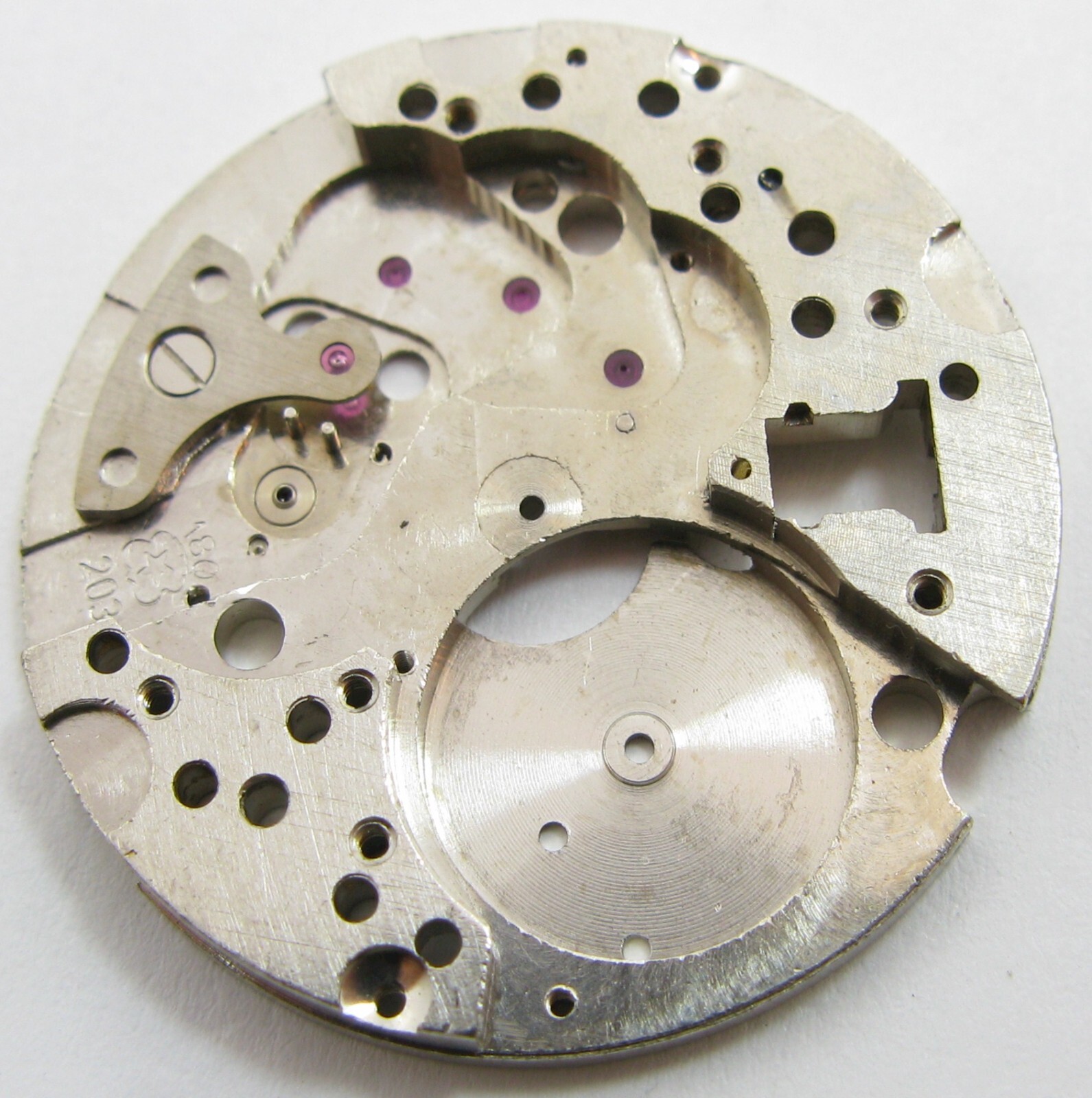 Venus 203 watch movement part: main plate #100 diameter 25.9 mm