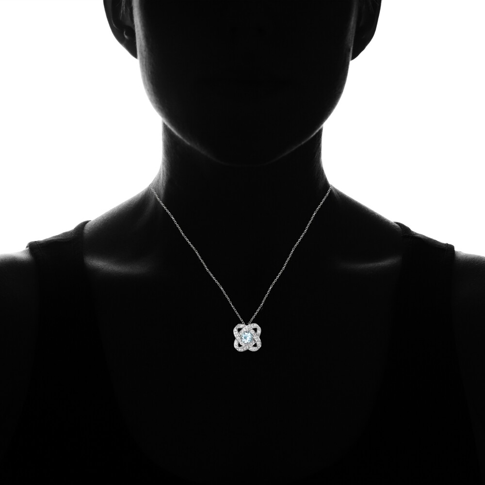 Sterling Silver Blue and White Topaz Love Knot Necklace