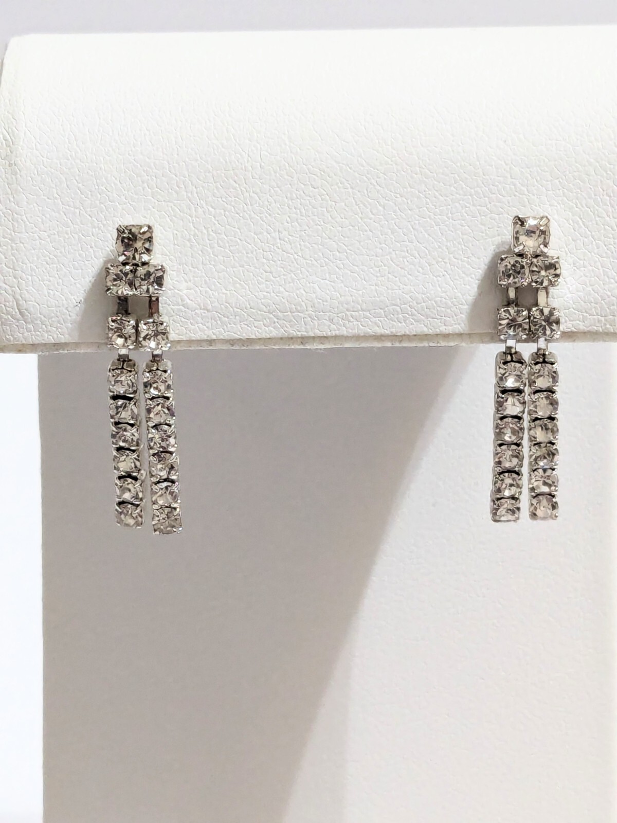 Silver Tone Layered Prong Set Rhinestone Stud/Drop Earrings. 1″. Modern.