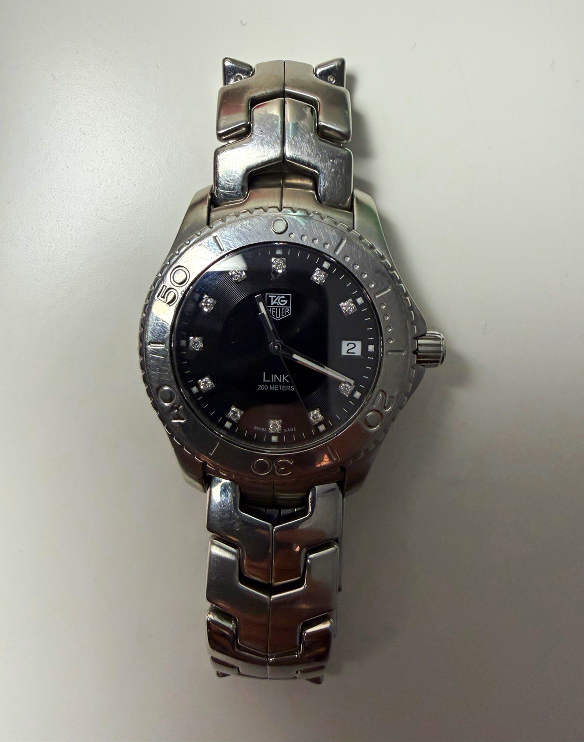 TAG Heuer Link Men’s Watch – Diamond hour markers and date window