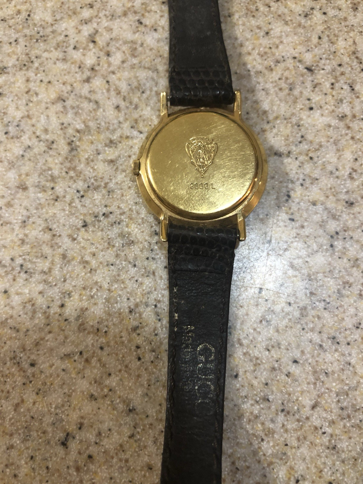 Gucci 3000L Women’s Quartz Watch Gold Dial Roman Numerals Black Leather