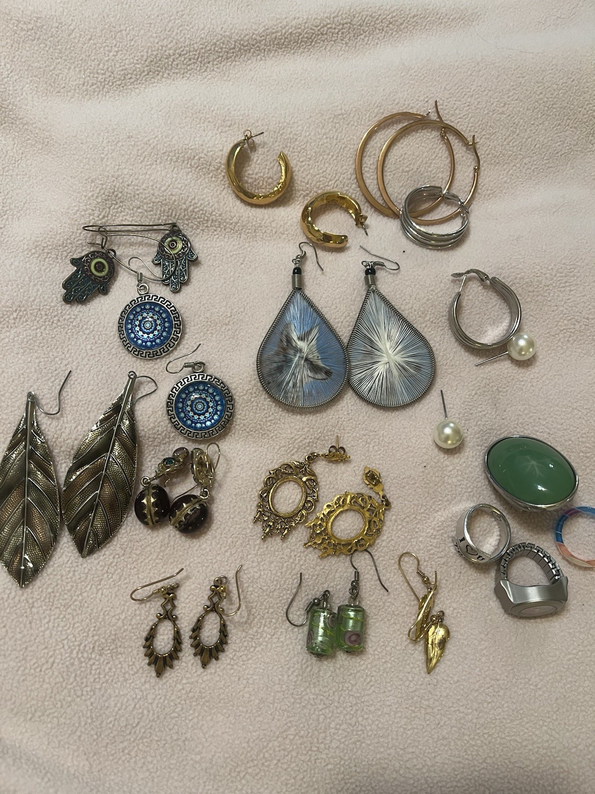Mixed Lot Of 13 Pairs Of Earrings. 4 rings. Preowned