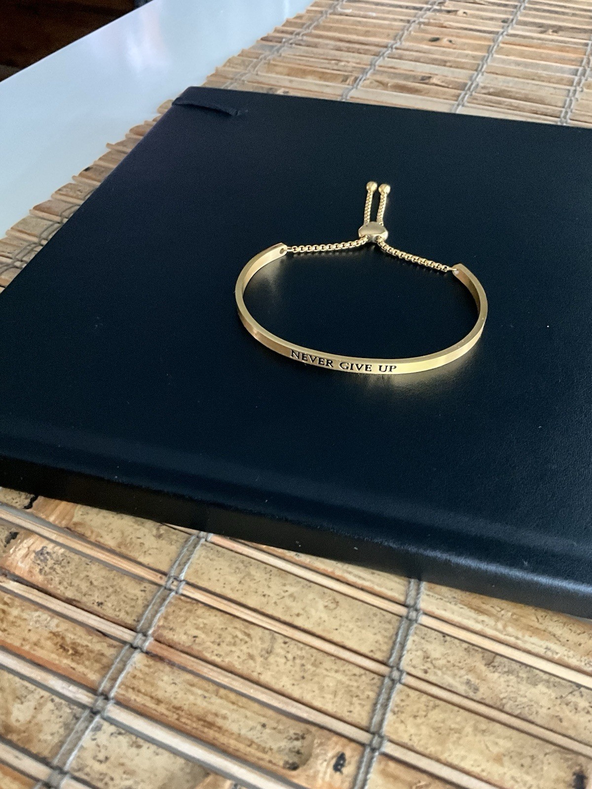 RCI CN Adjustable Gold Tone Bangle Inspirational Bracelet “Never Give Up”