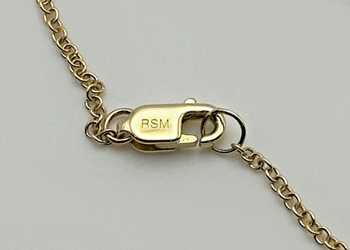 14k Gold 18″ Necklace, Horseshoe center piece set with 0.08cts of Diamonds 2g