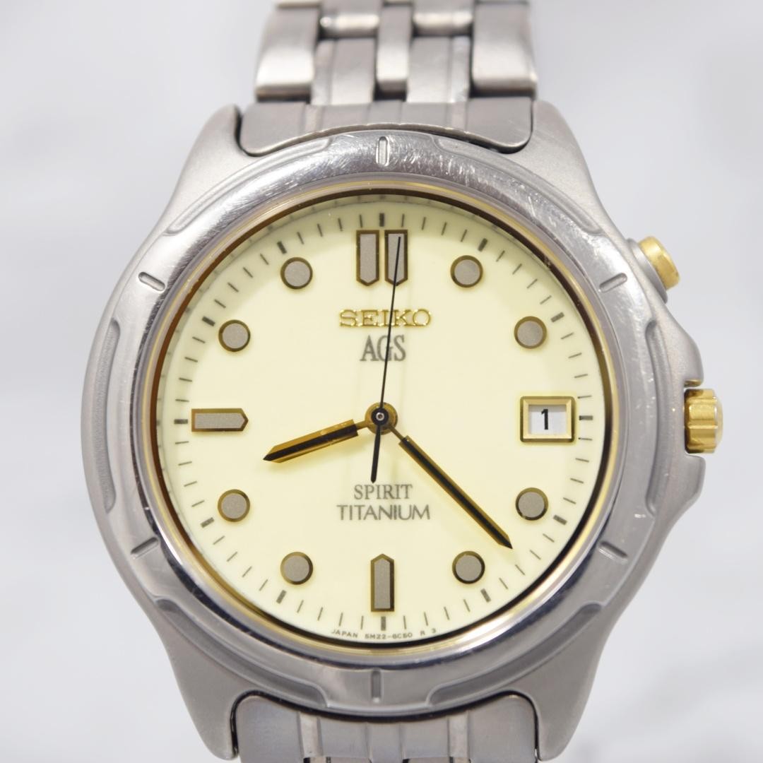 1996 SEIKO Spirit AGS Titanium watch with date display, non-functional.