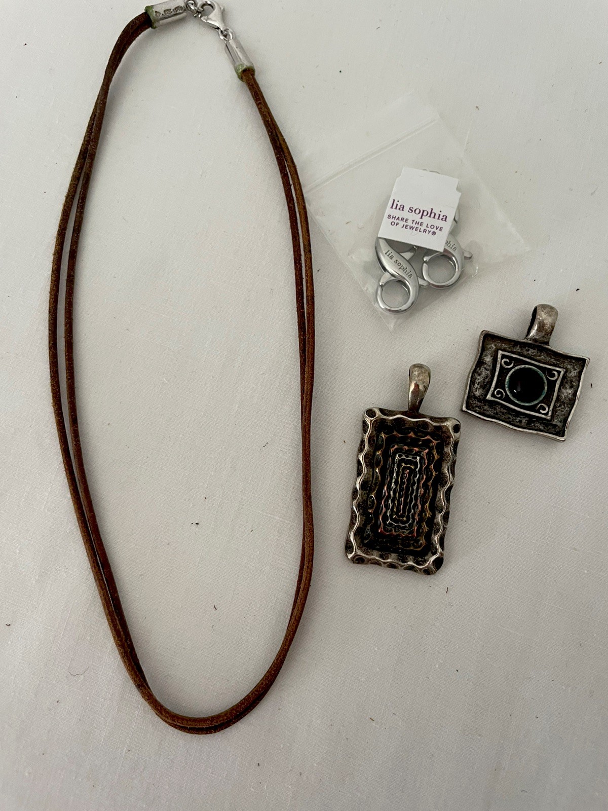 Lot of 2 Necklace Pendants Slides – Lia Sophia, Enamel, Metal…Leather necklace
