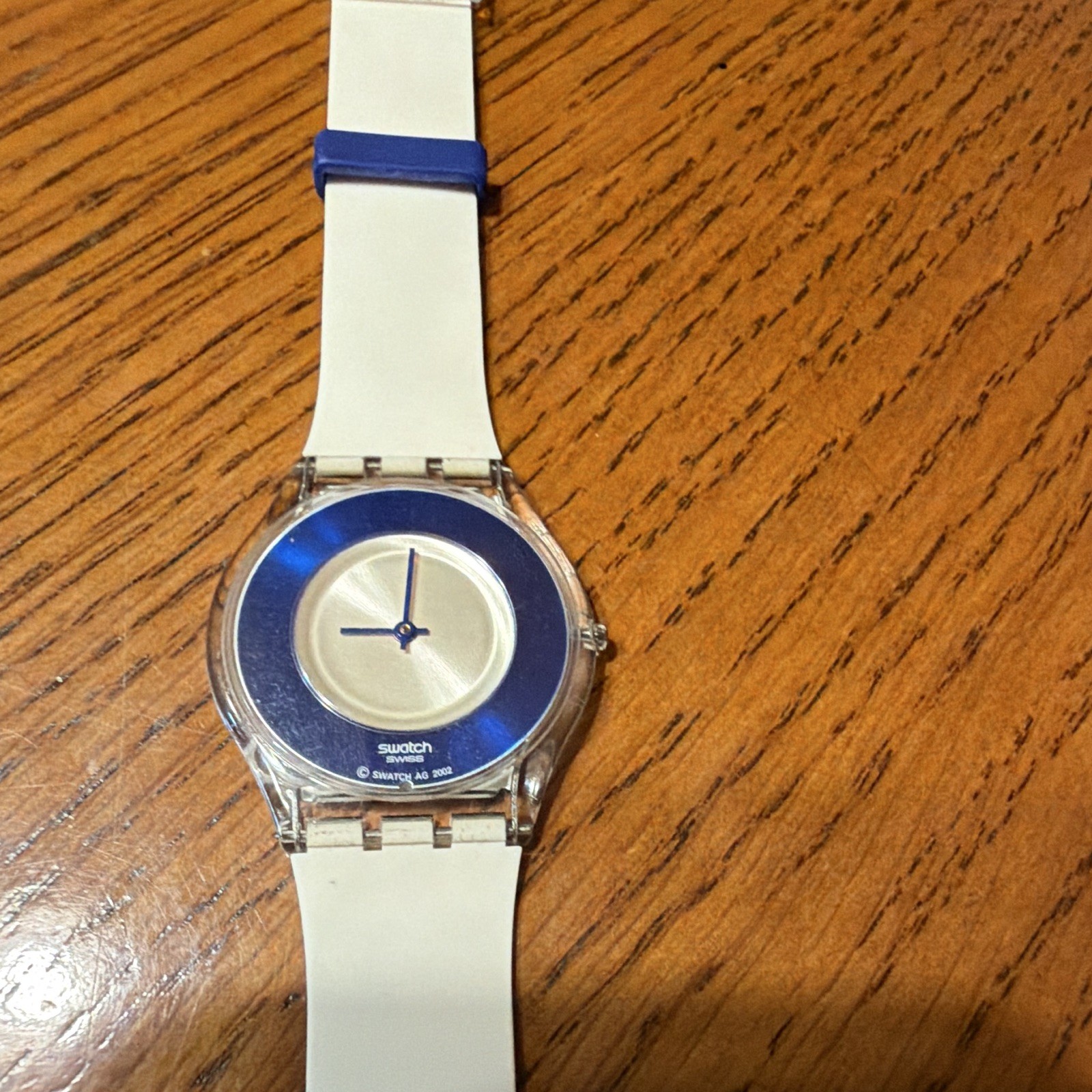 Swatch Swiss Made Quartz Analog Blue Dial Clear Plastic Case White Strap
