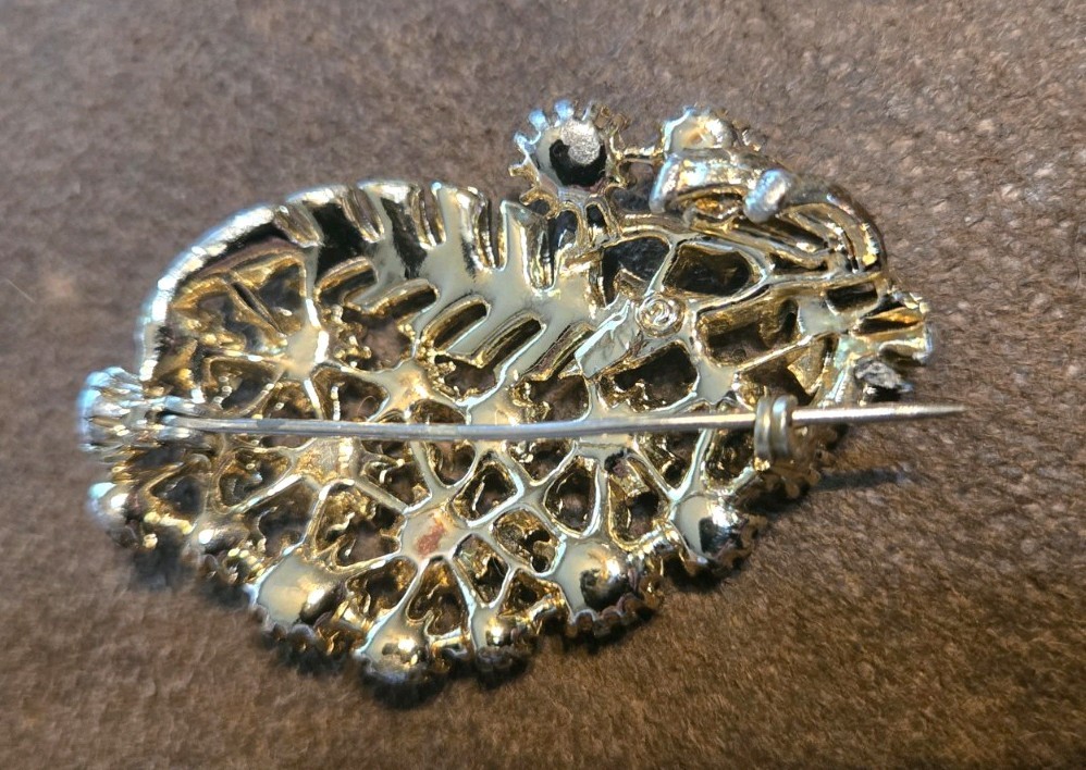 Vintage gold-tone statement brooch from the mid-20th century, costume jewelry