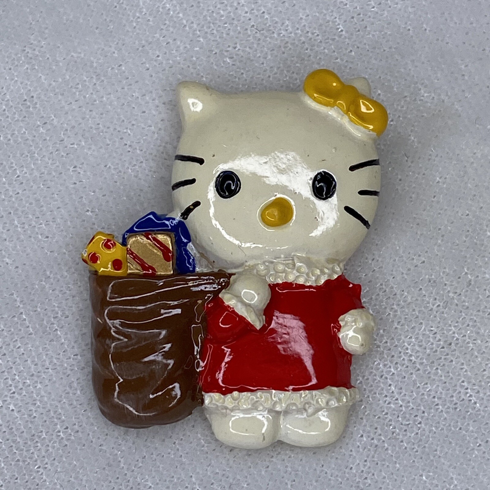 Vintage Hello Kitty Brooch Pin Christmas Jewelry 1.5″ long Plastic/Resin