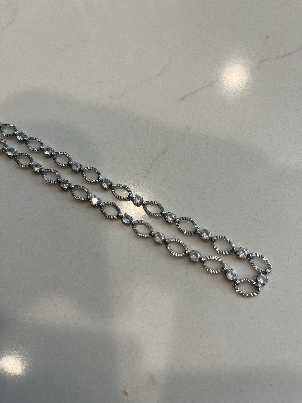 Anthropologie silver colored white crystal adjustable length necklace