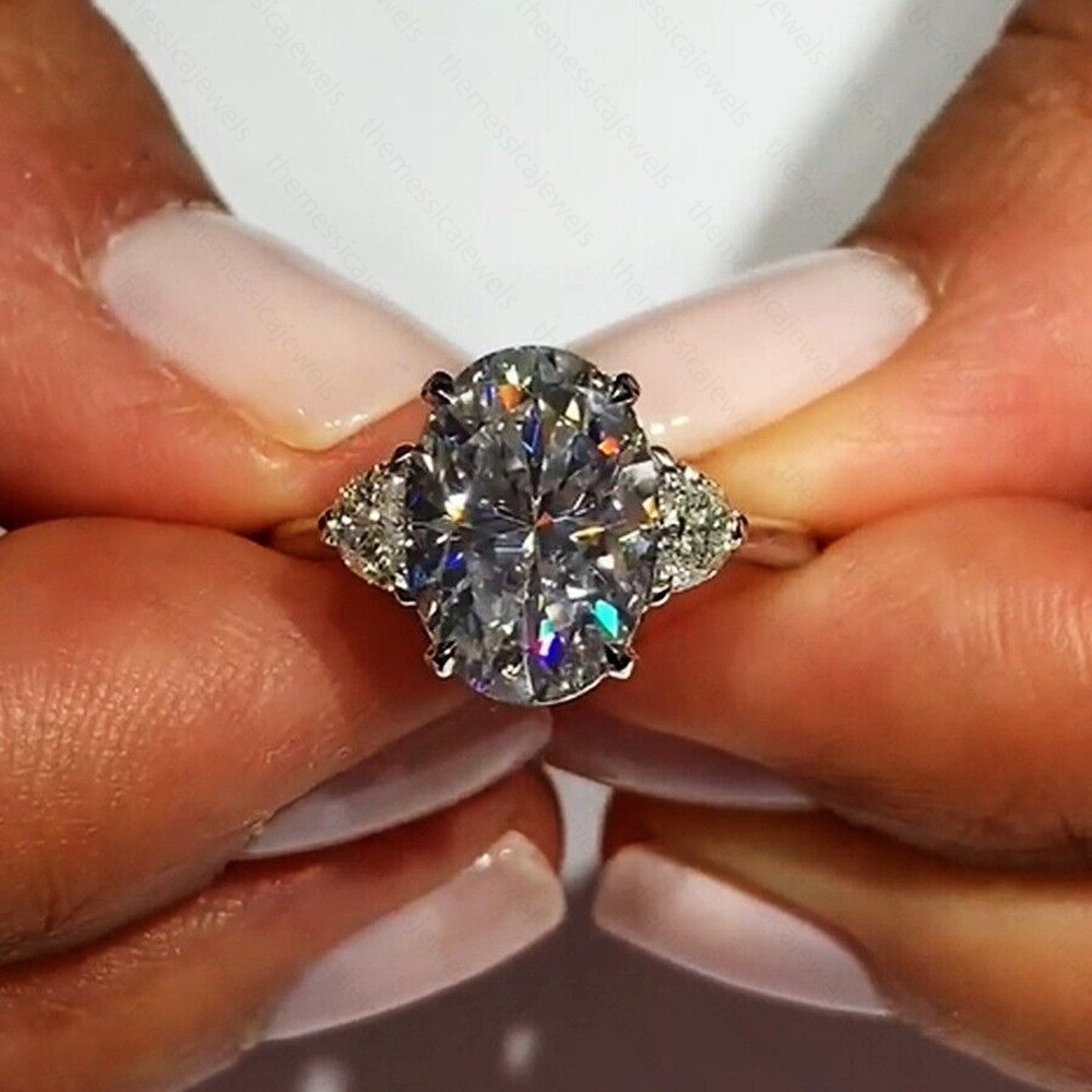 3.54Ctw Oval Cut Moissanite Three Stone Engagement Ring In 14K White Gold Plated