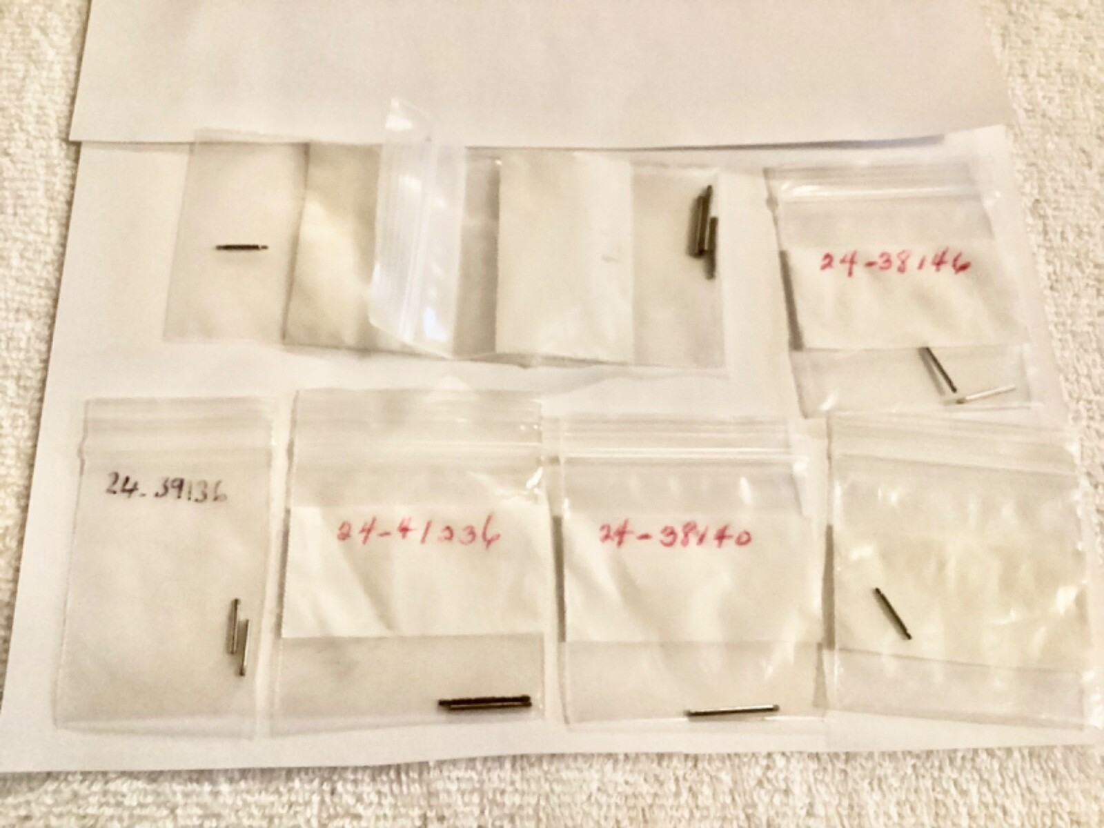 watch band pins unkown parts some with numbers