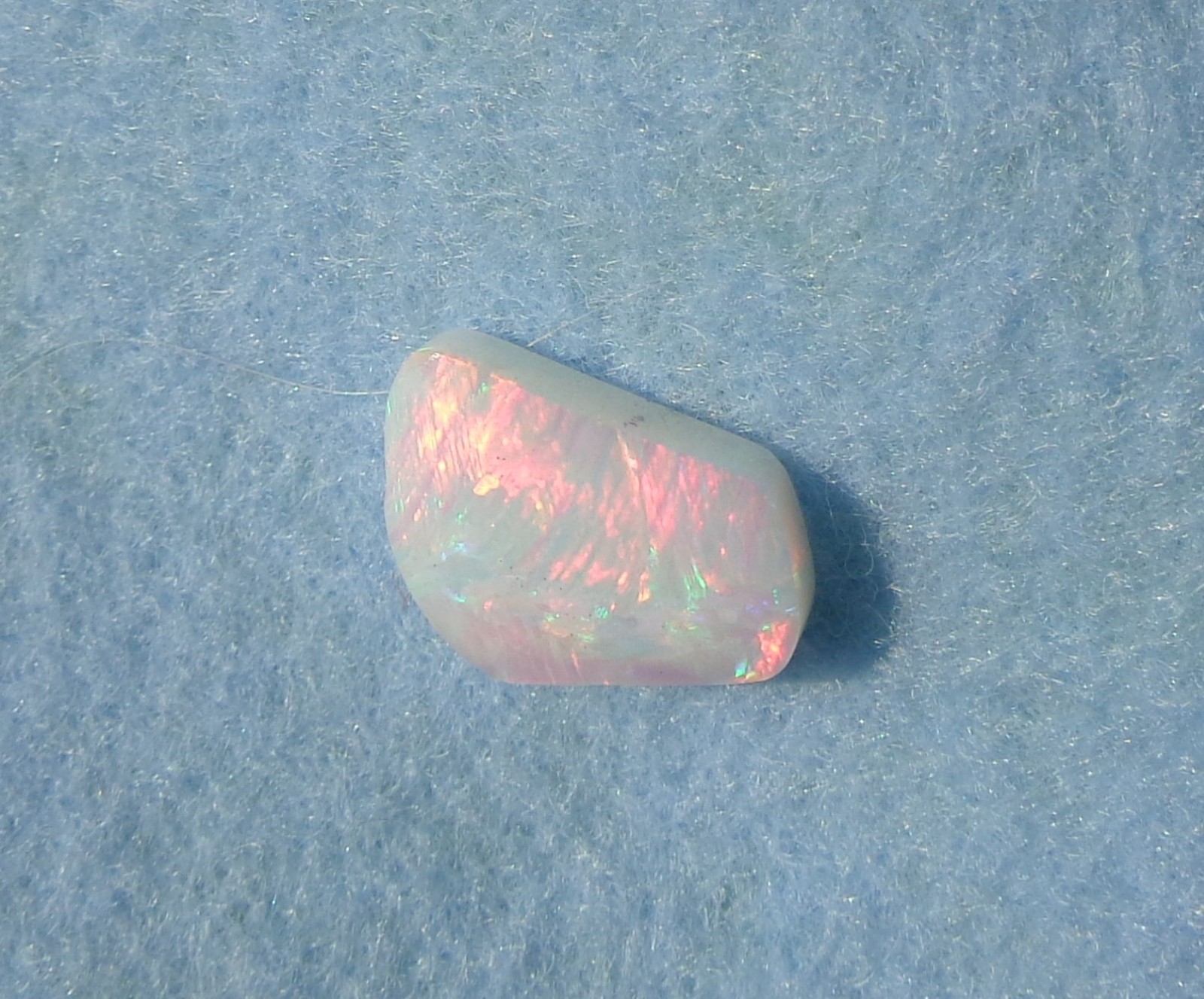 Spencer Idaho Opal Solid 9X15 mm with Unique Pattern and Red, Green, & Gold Fire