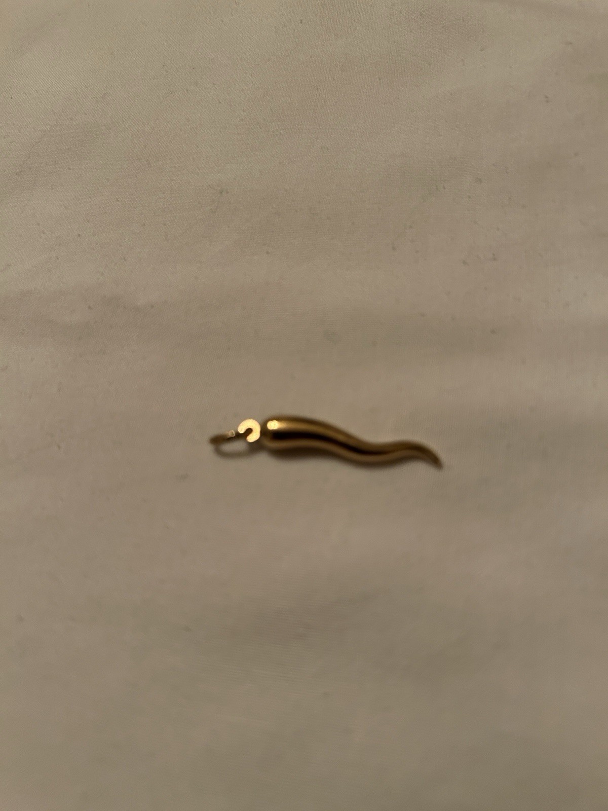 18k solid gold Italian horn weight is 1.2gr. includes 28″ 18K gold Neckless