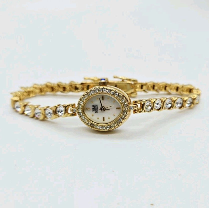 Nolan Miller Watch Tennis Bracelet Crystal Gold tone New battery Oval 7.25 in