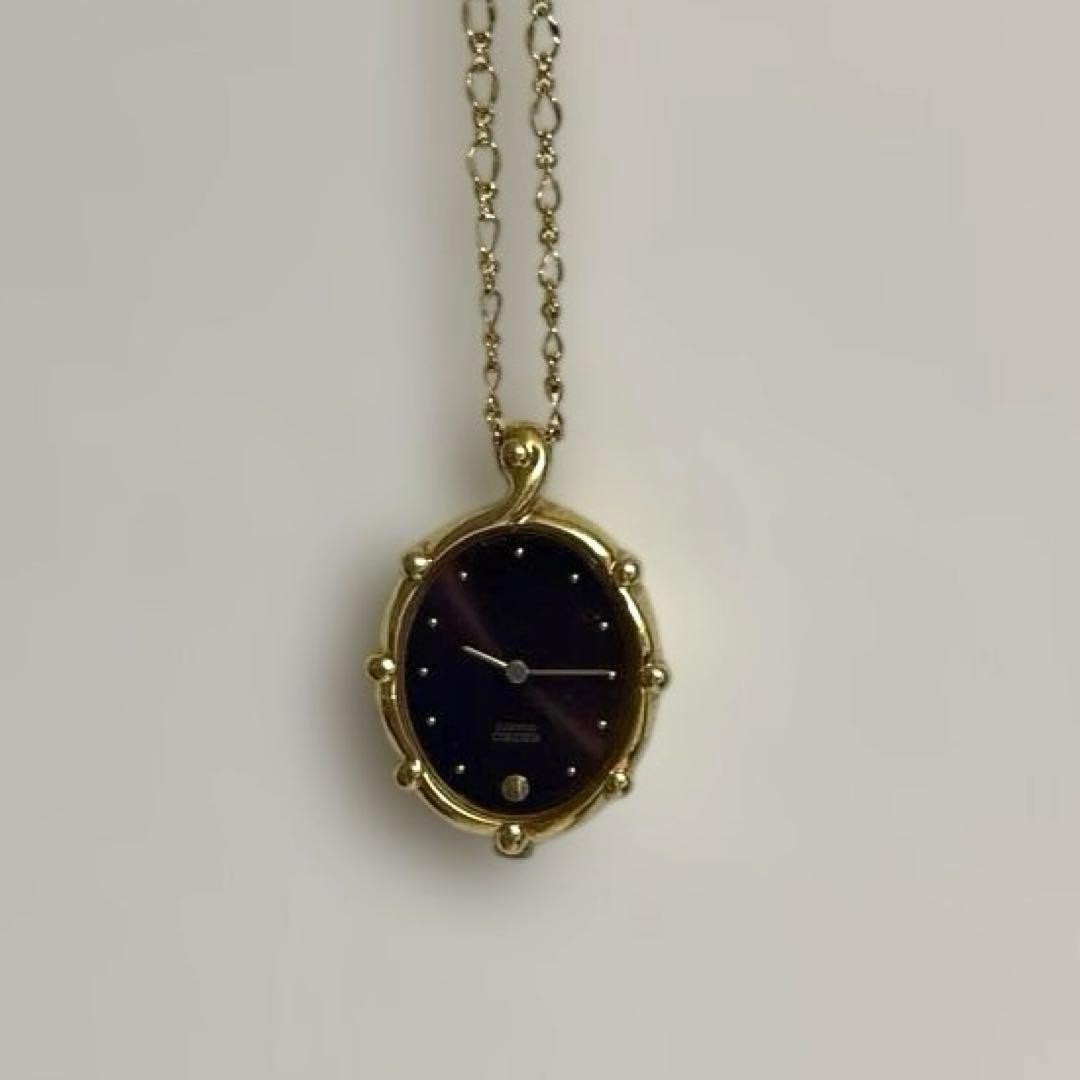 Seiko pendant watch, gold chain, working, burgundy dial.
