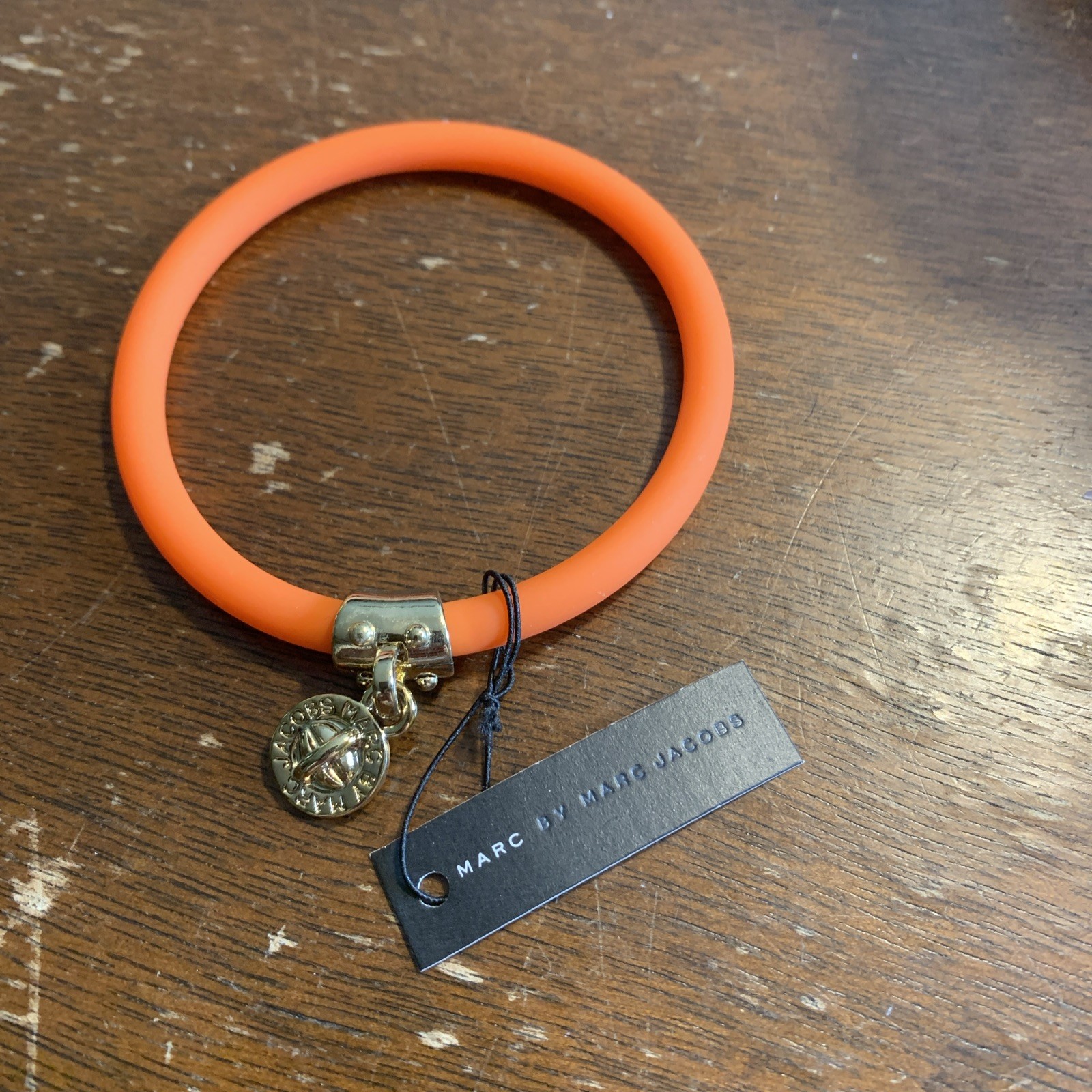 Marc by Marc Jacobs Fluoro Orange Silicone Stretch Bracelet with Gold Charm NWT