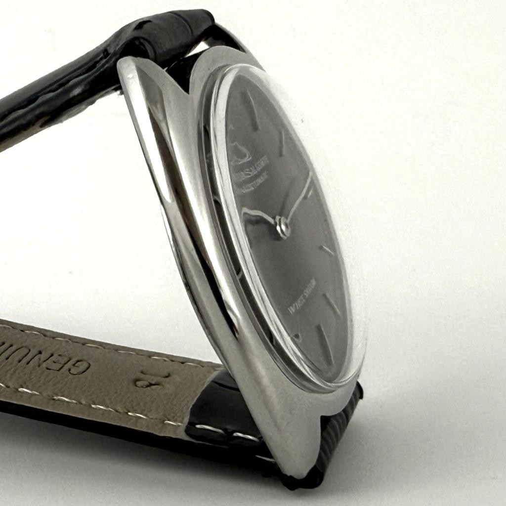 ELEGANT UNIVERSAL WHITE SHADOW MICRO-ROTOR THIN CAL 2–66 VINTAGE BLACK DIAL