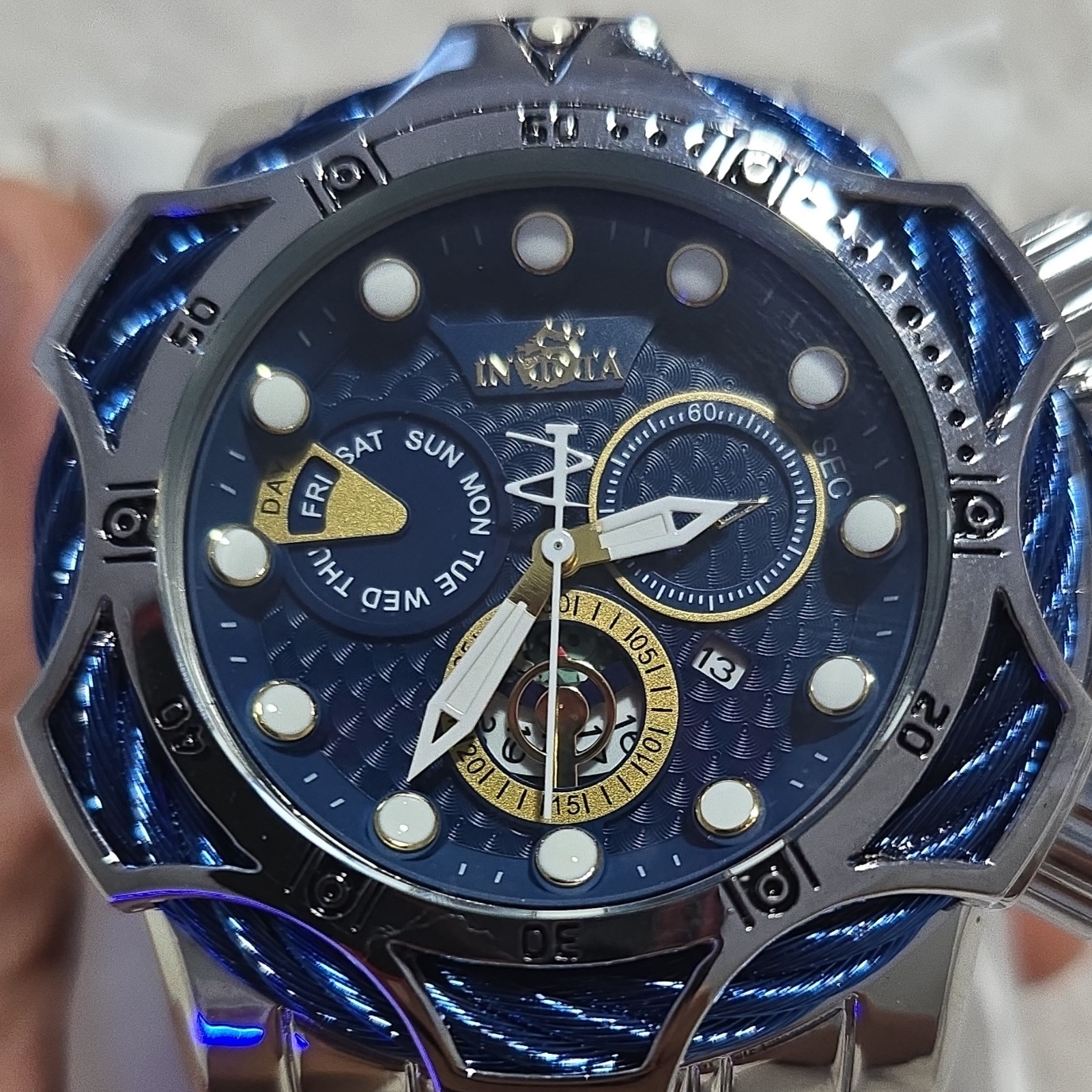 Invicta men’s watch, blue dial and silver bracelet. Not original but very nice s
