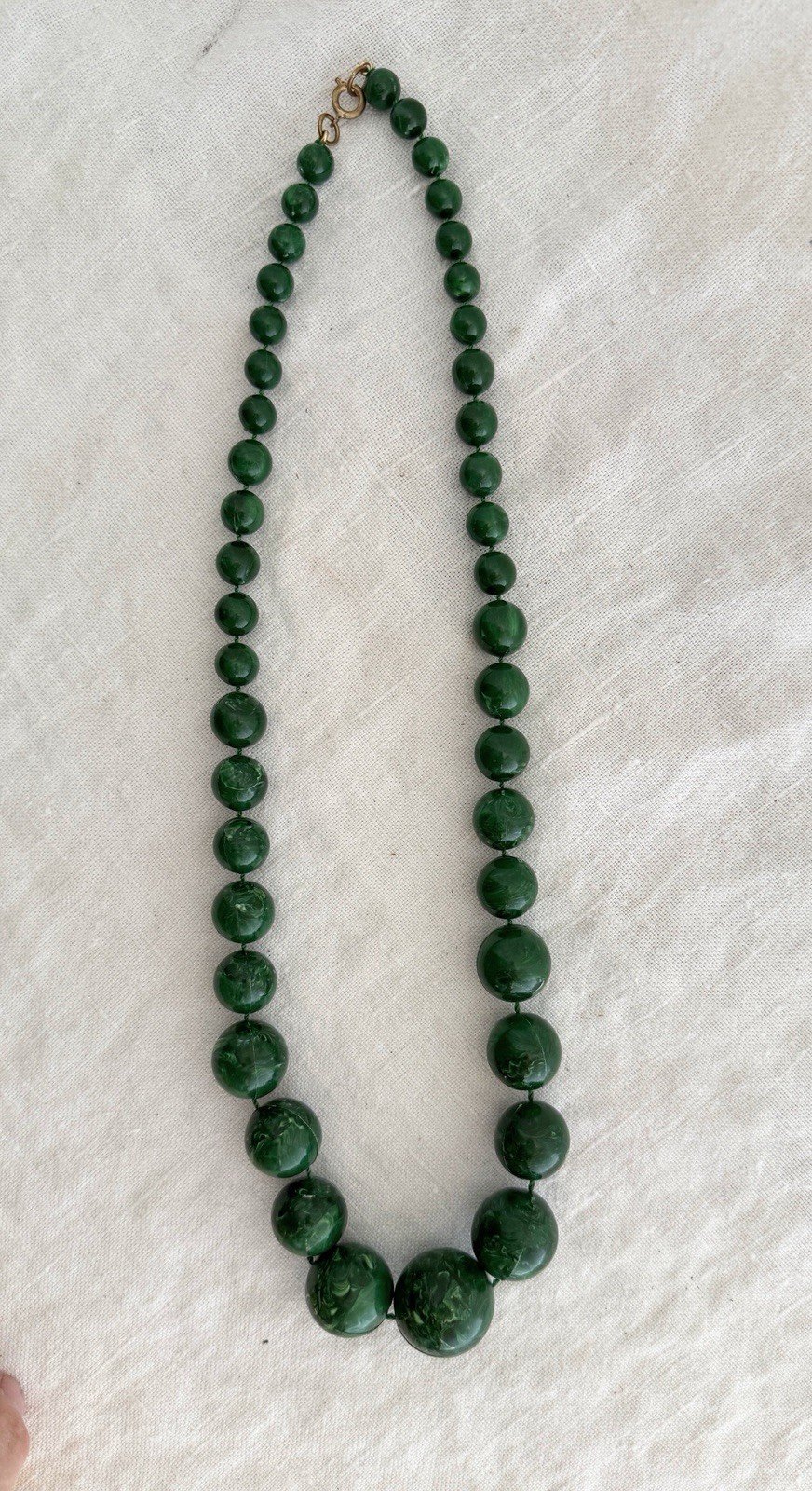 Graduated green plastic resin bead necklace