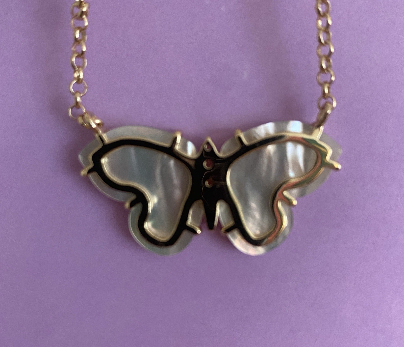 Jane Win “Free” Mother of Pearl Butterfly necklace.
