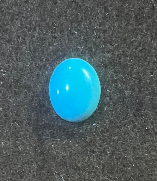 One 10x8x3.2mm Sleeping Beauty Turquoise Oval Cabochons 1.7carats