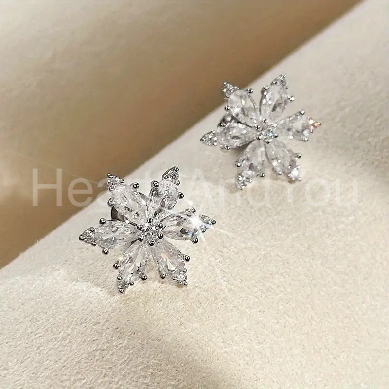 2ct Pear Cut Moissanite Floral Snowflake Stud Earrings 14K White Gold Plated