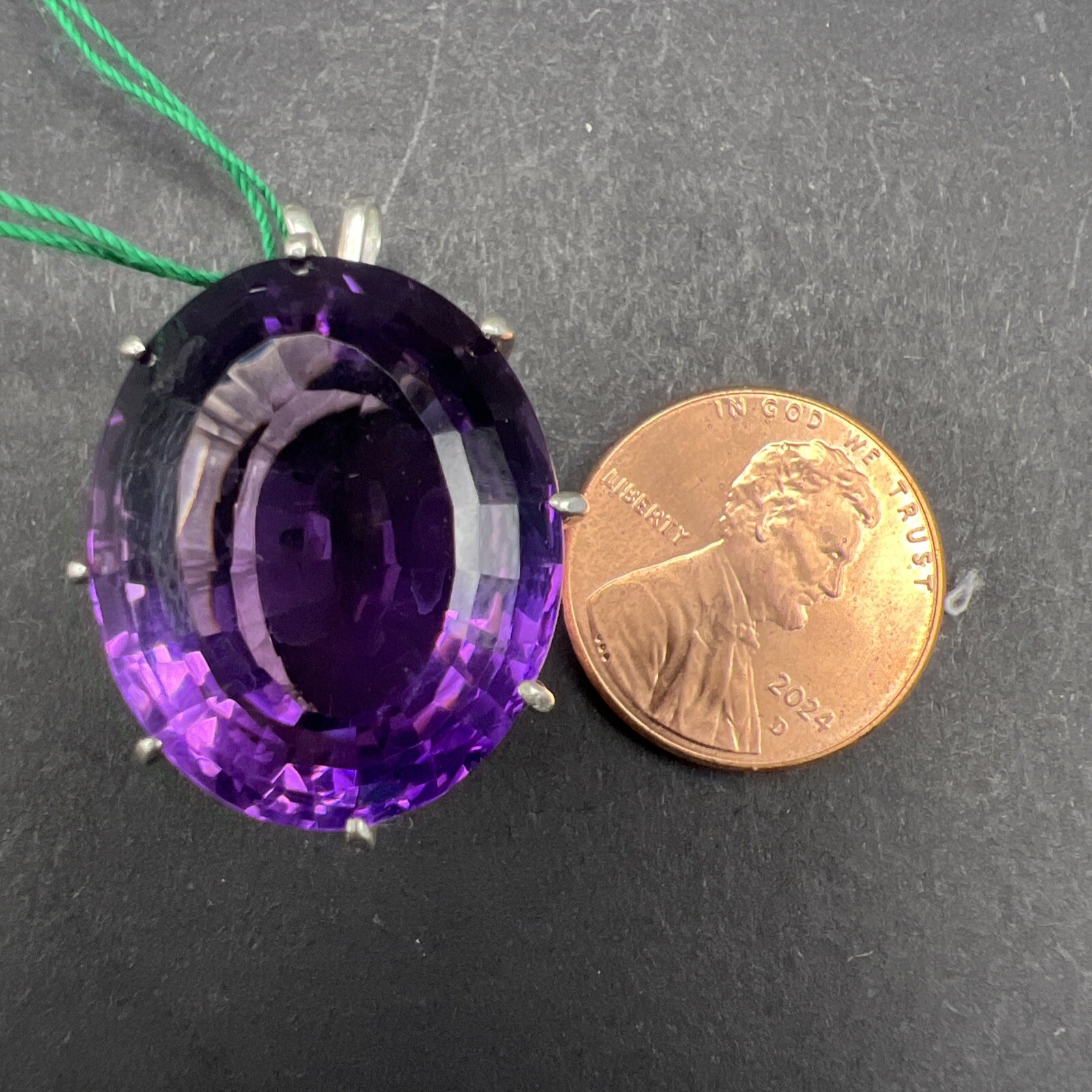 31.69 ct Amethyst and Sterling Silver Pendant. 8.8 Grams