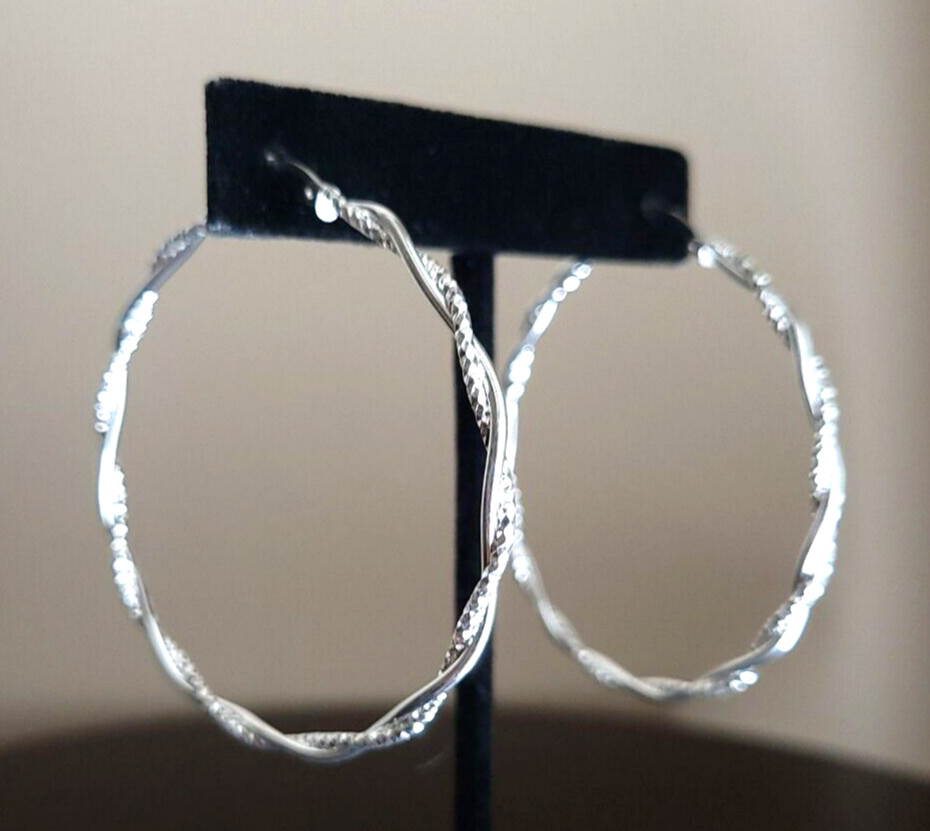 Erick’s Sterling Silver Braided 2 1/8 in. wide Hoop Earrings Taxco.925