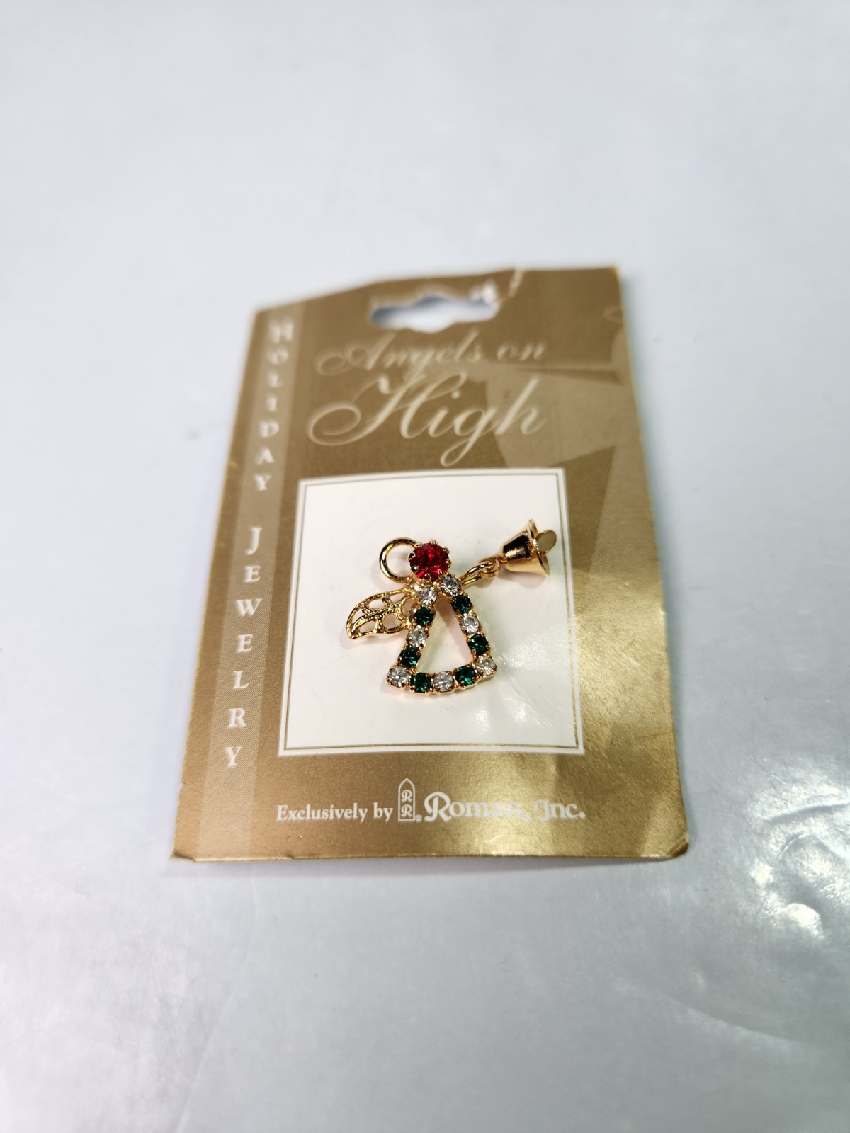 Christmas Pin Angels On High Roman Inc Gold Tone Green And Clear Crystals 2001