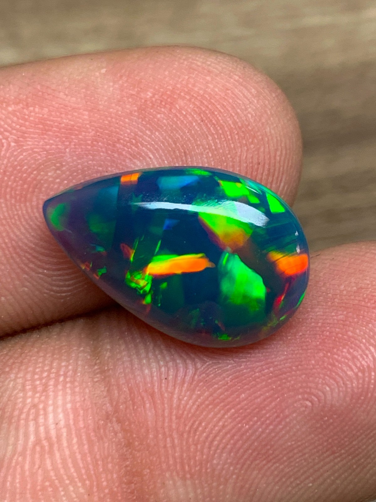 Ethiopian Opal Gemstone 4.65crt Pear Cabochon Black Welo Rainbow Flash Gemstone